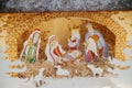 Nativity scene. Holy night scene with saint figurines and baby Jesus in creche.Christmas decor in city street. Winter holidays in Royalty Free Stock Photo