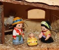 Nativity scene with statues of hand-decorated pottery Royalty Free Stock Photo