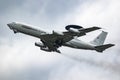 NATO Boeing E-3 Sentry AWACS radar plane performing a low-pass at the Eindhoven Airbase.  The Netherlands - July 3, 2020 Royalty Free Stock Photo