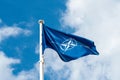 NATO flag waving in the wind Royalty Free Stock Photo