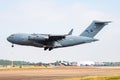 NATO Heavy Airlift Wing HAW SAC Boeing C-17A Globemaster 02 transport plane arrival and landing for RIAT Royal International Air Royalty Free Stock Photo