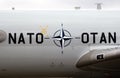 NATO logo and text on a AWACS E-3 Sentry radar plane Royalty Free Stock Photo