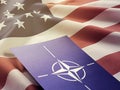 NATO symbol on the background of the American flag. Organization of the North Atlantic Treaty.