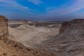 Natt over Ustyurt Plateau. District of Boszhir. The bottom of a dry ocean Tethys. Rocky remnants. Kazakhstan. selective focus. Royalty Free Stock Photo