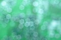 Natural abstract green background with circular bokeh. Number 01