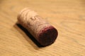 a natural wine cork with little cork bleed of red wine