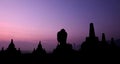 Natural amazing sunrise view at Borobudur Buddhist temple, great religious architecture in Magelang, Central Java, Indonesia. Royalty Free Stock Photo