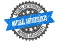 Natural antioxidants stamp. natural antioxidants grunge round sign. Royalty Free Stock Photo