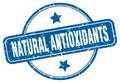 natural antioxidants stamp. natural antioxidants round grunge sign. Royalty Free Stock Photo