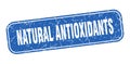 natural antioxidants stamp. natural antioxidants square grungy isolated sign.