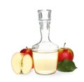 Natural apple vinegar and fresh fruits on white background Royalty Free Stock Photo