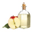 Natural apple vinegar and fresh fruits on white background Royalty Free Stock Photo
