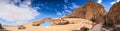 Natural arch in desert with sandstone and granite rock Wadi Rum in Jordan