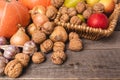 Natural autumn harvest. Close-up of colorful vegetables and fruits lying on old boards. Royalty Free Stock Photo