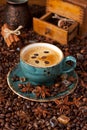 Natural background with coffee beans and coffee in  mug Royalty Free Stock Photo