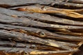 Natural texture of dry smoked sea fish needles in the heap