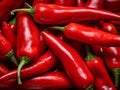 Natural background of fresh red chili peppers with water drops. Full frame. A quality product. Healthy eating.