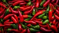 Natural background of fresh red and green chili peppers. A quality product. Healthy eating. Close-up