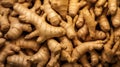 Natural background of fresh and ripe ginger root on market. A delicious quality vegetarian product. Healthy organic eating. Spice