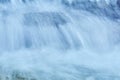 Natural background - the jets of the waterfall are blurred in motion Royalty Free Stock Photo