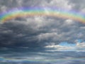 Natural background with rainbow in sea reflection Royalty Free Stock Photo