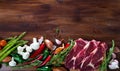 Natural background with raw beef, vegetables Royalty Free Stock Photo