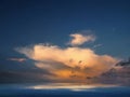 Natural background with sunset and stormy clouds in sea reflection Royalty Free Stock Photo