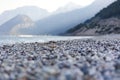 The natural background texture white sea stones of Sarisu Beach. Royalty Free Stock Photo