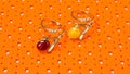 Amber rings. Baltic amber. Collage, decorative background.