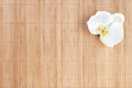 Natural bamboo background with orchidea Royalty Free Stock Photo