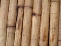 Natural bamboo fence background texture. Asian brown inclined st Royalty Free Stock Photo