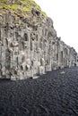 Basalt stone columns and black sand beach, Reynisfjara, Iceland Royalty Free Stock Photo