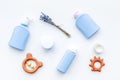 Natural bath cosmetics for kids. Bottles and toys on white background top view Royalty Free Stock Photo