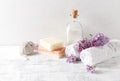 Natural bath salt, soap, cotton towels and lilac flowers symbolic image Royalty Free Stock Photo