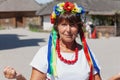 Portrait of elderly woman with wreath on her head