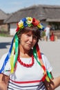 Portrait of elderly woman with wreath on her head