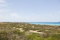 Natural beauty of Aruba. North coast. Amazing desert landscape and blue ocean Royalty Free Stock Photo