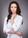 The natural beauty and brooding eyes. Young woman with long dark hair Royalty Free Stock Photo