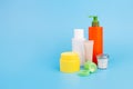 Natural beauty dermatology cosmetic cream white bottle and orange bottle, yellow cream jar, skin care