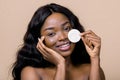 Natural beauty, people, races concept. Close up portrait of pretty smiling young african woman with bare shoulders Royalty Free Stock Photo