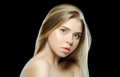 Natural beauty. Portrait of beautiful young woman with shiny blonde straight long hair, with Clean Fresh Skin look away Royalty Free Stock Photo
