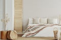 Natural bedroom deign, copy space on empty wall Royalty Free Stock Photo