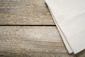 Natural beige cotton cloth on wooden table