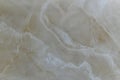 Natural beige polished marble with diagonal wavy lines