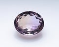 Natural bicolor ametrine on the white background