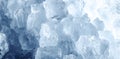 Natural blue ice with a beautiful winter texture and white cracks forms an abstract pattern, ideal for use as a Royalty Free Stock Photo