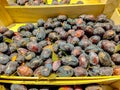 Natural blue plums are in a drawer in the store Royalty Free Stock Photo