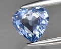 natural blue spinel gem on the background Royalty Free Stock Photo