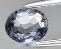natural blue spinel gem on the background Royalty Free Stock Photo