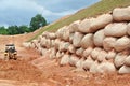 Natural boulders are used as retaining walls of ground banks that have been embanked.